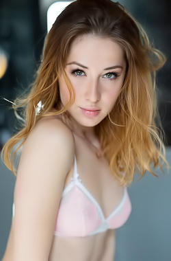 Sweetie explores her naked body in bed
