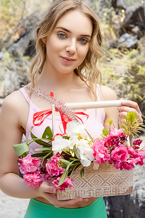 Oxana Chic Shows Off In Crop Top Gathering Flowers, Teasing View Under Shorts